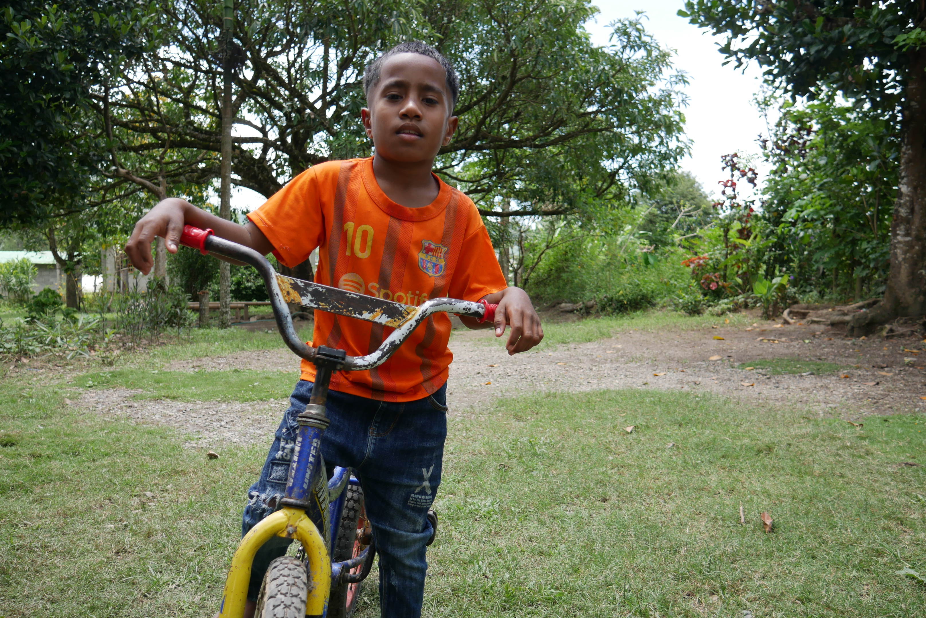 Manu looking cool on his bicycle